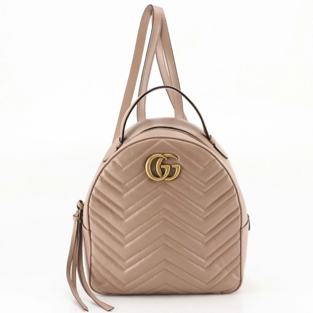 Gucci GG Marmont Matelasse Ouilted
Backpack in Beige Leather